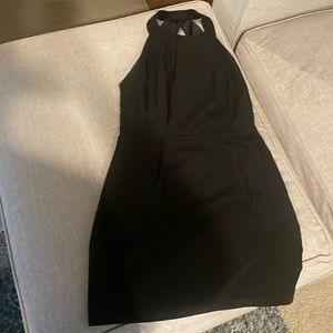 Black short backless BCBGeneration size 6 dress.